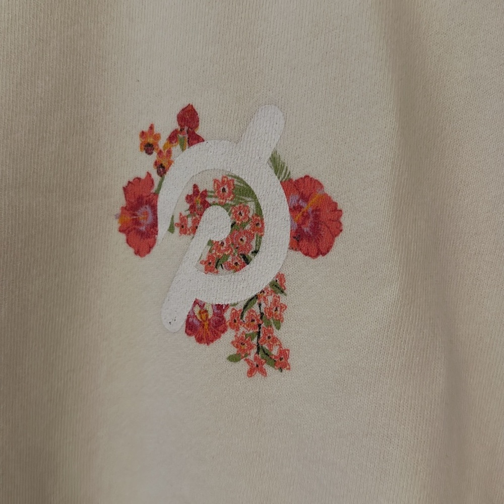 Peloton Cream Sweatshirt with Pink & Red Floral Logo - Picture 3 of 5